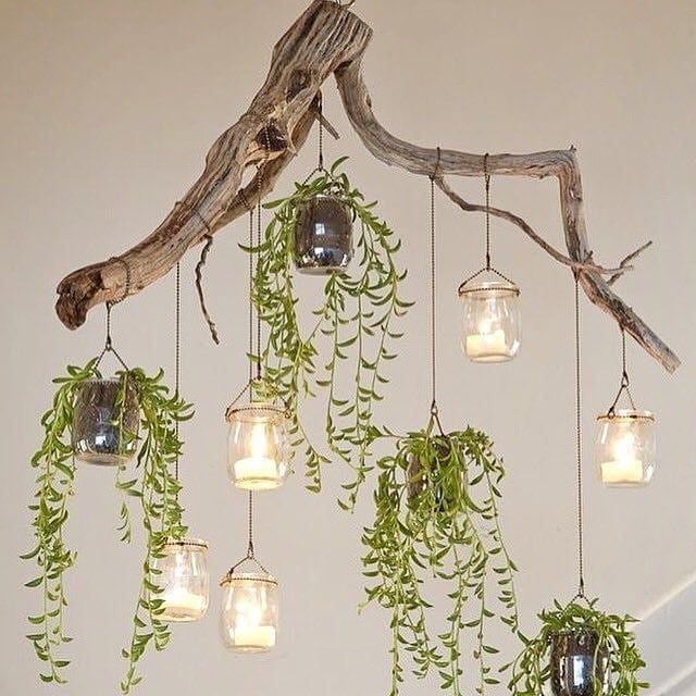 eclectic chandelier with mixed plants and materials