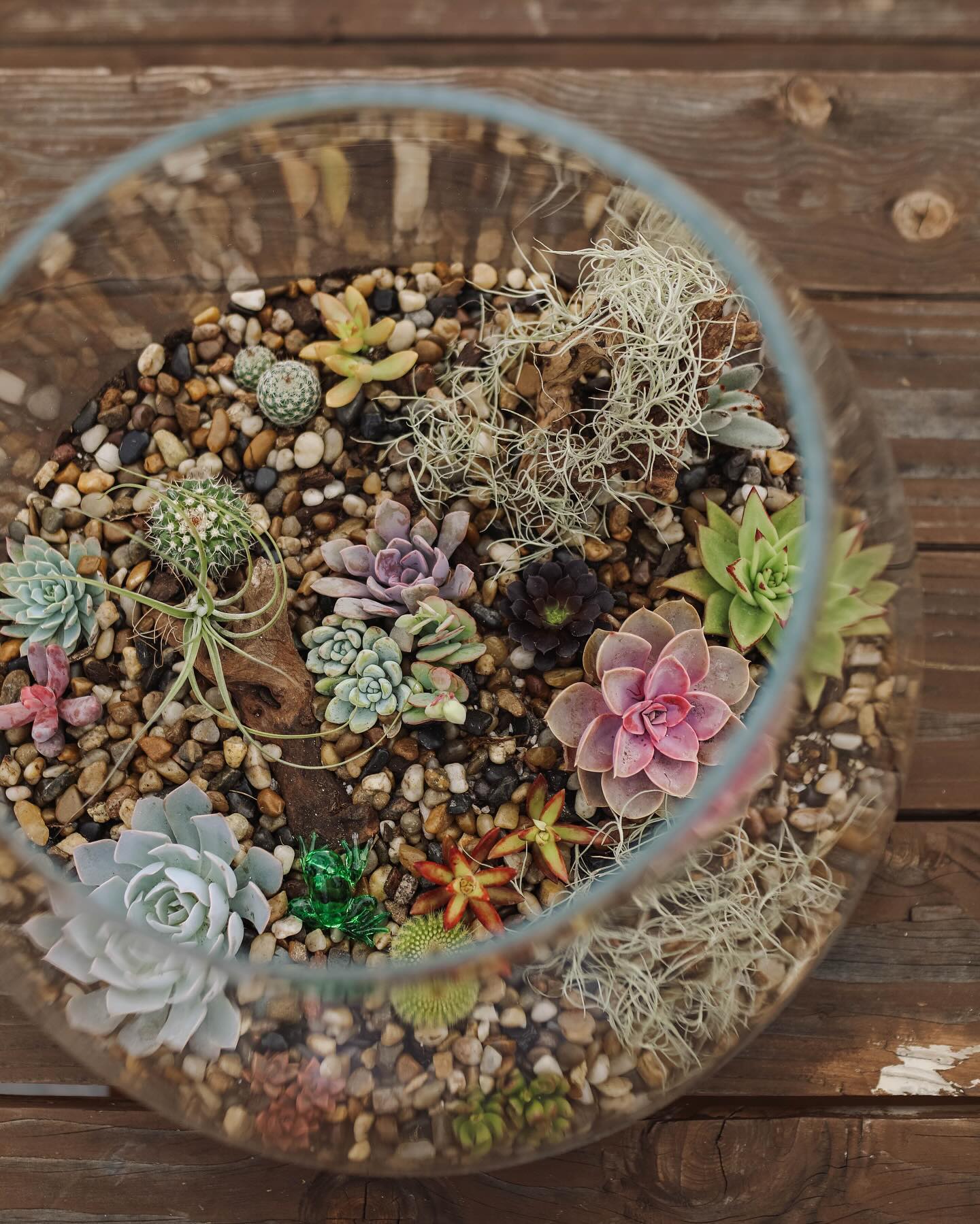 pebbles layered in glass jar