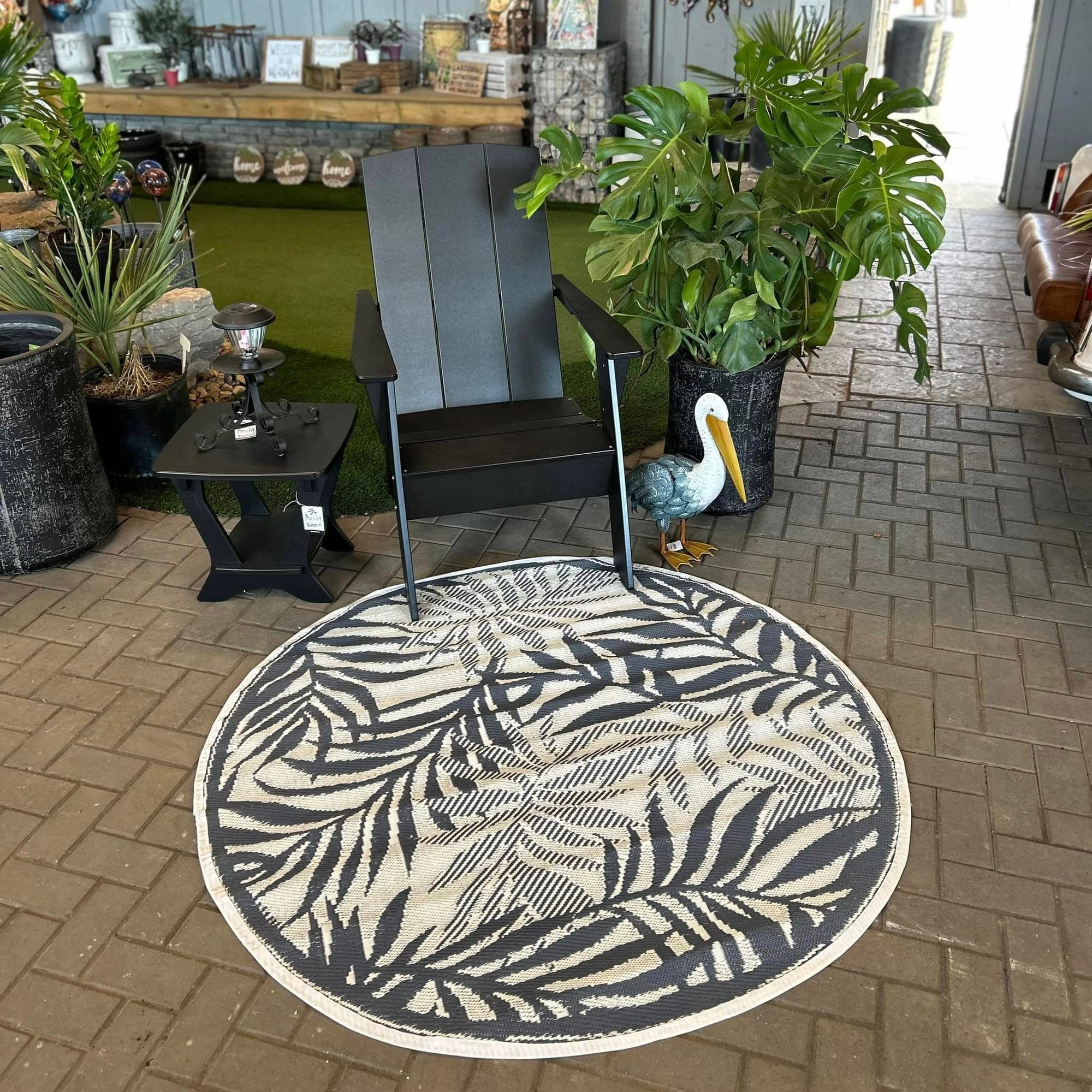 room with tropical leaf rug