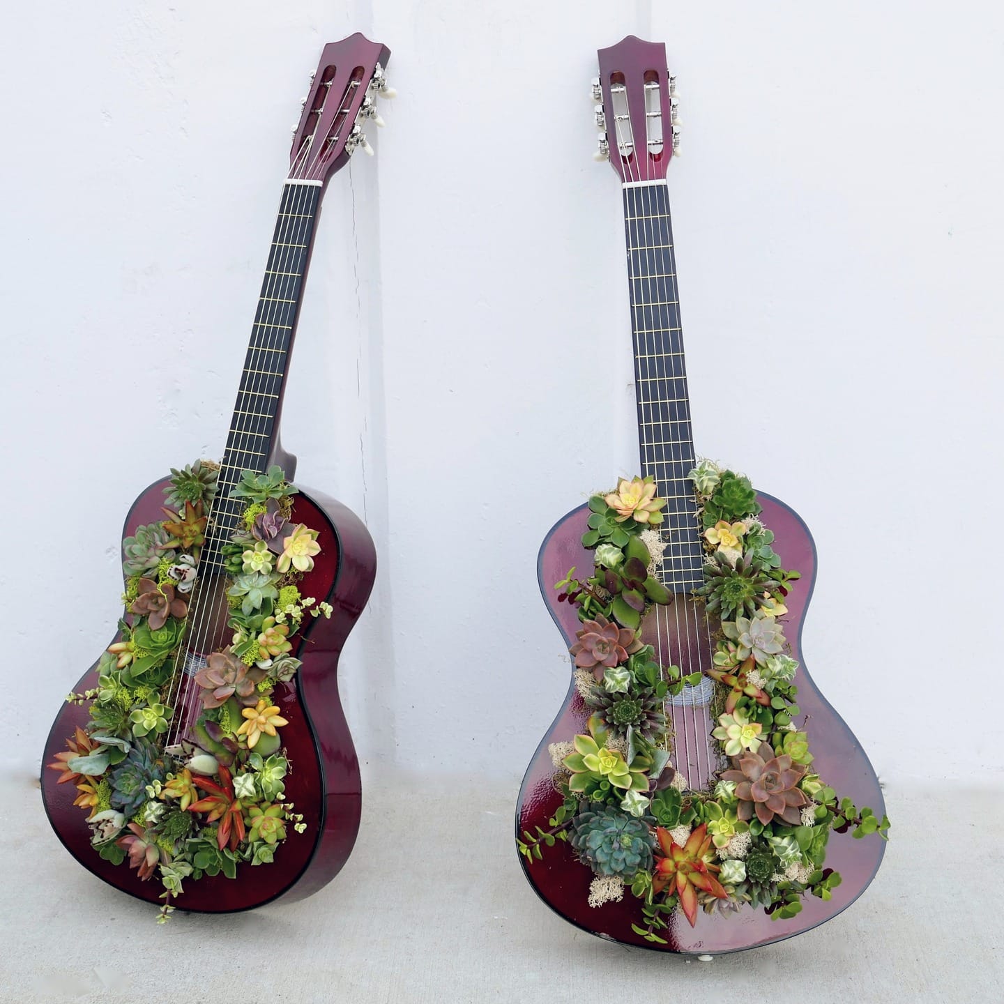 guitar planter with beach-themed decor