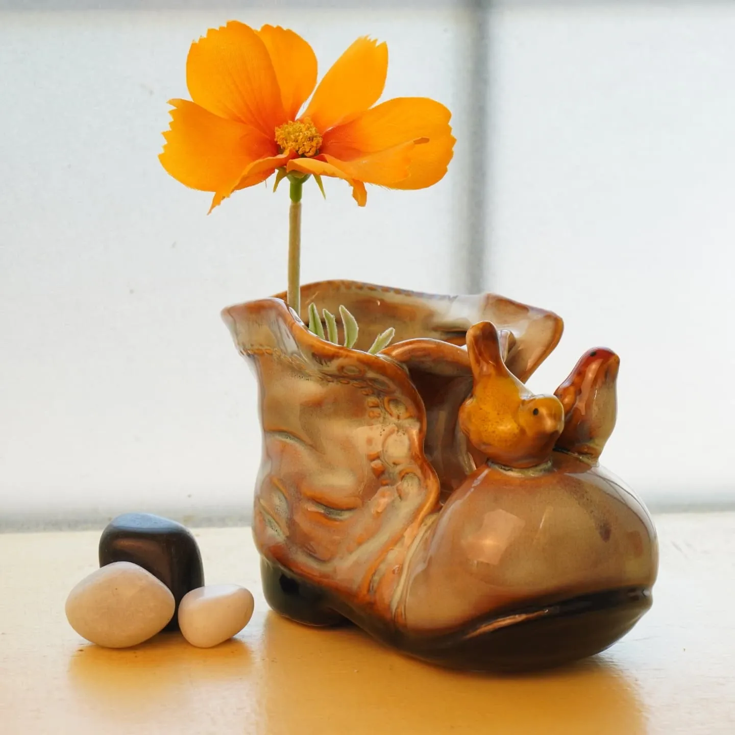 fun wooden shoe plant holder in kid's room