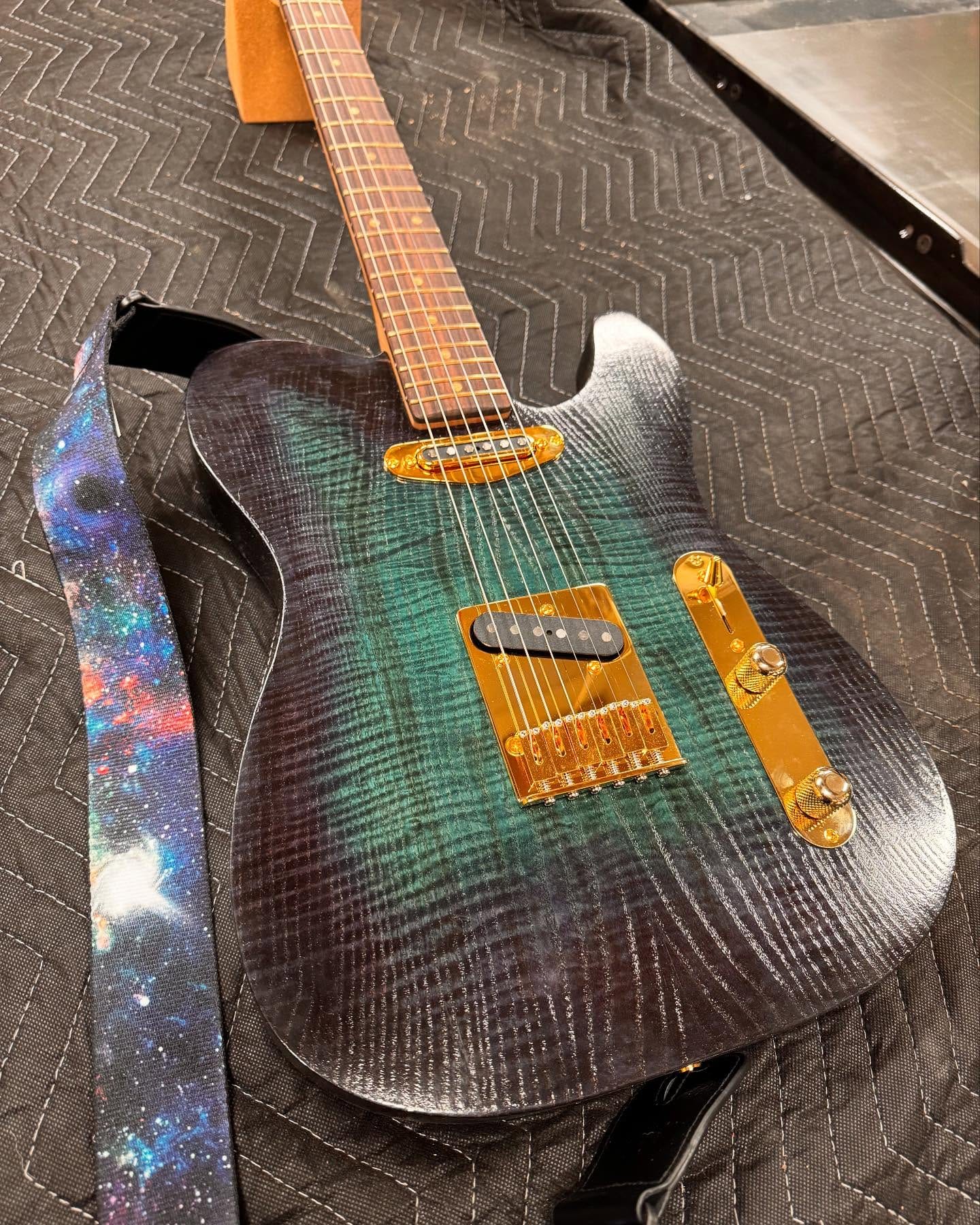 guitar neck with climbing plant