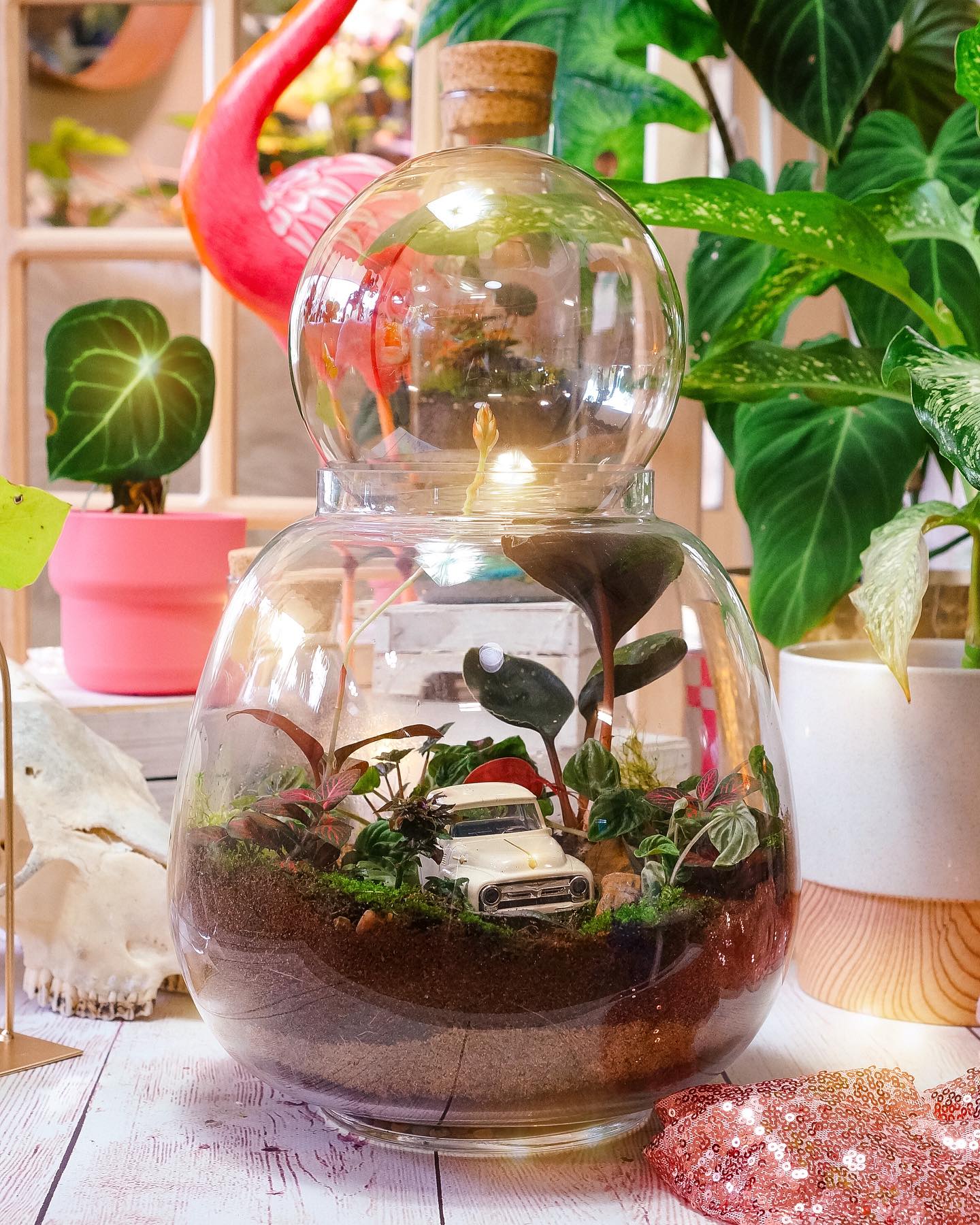 seasonal themed glass terrarium with autumn decor