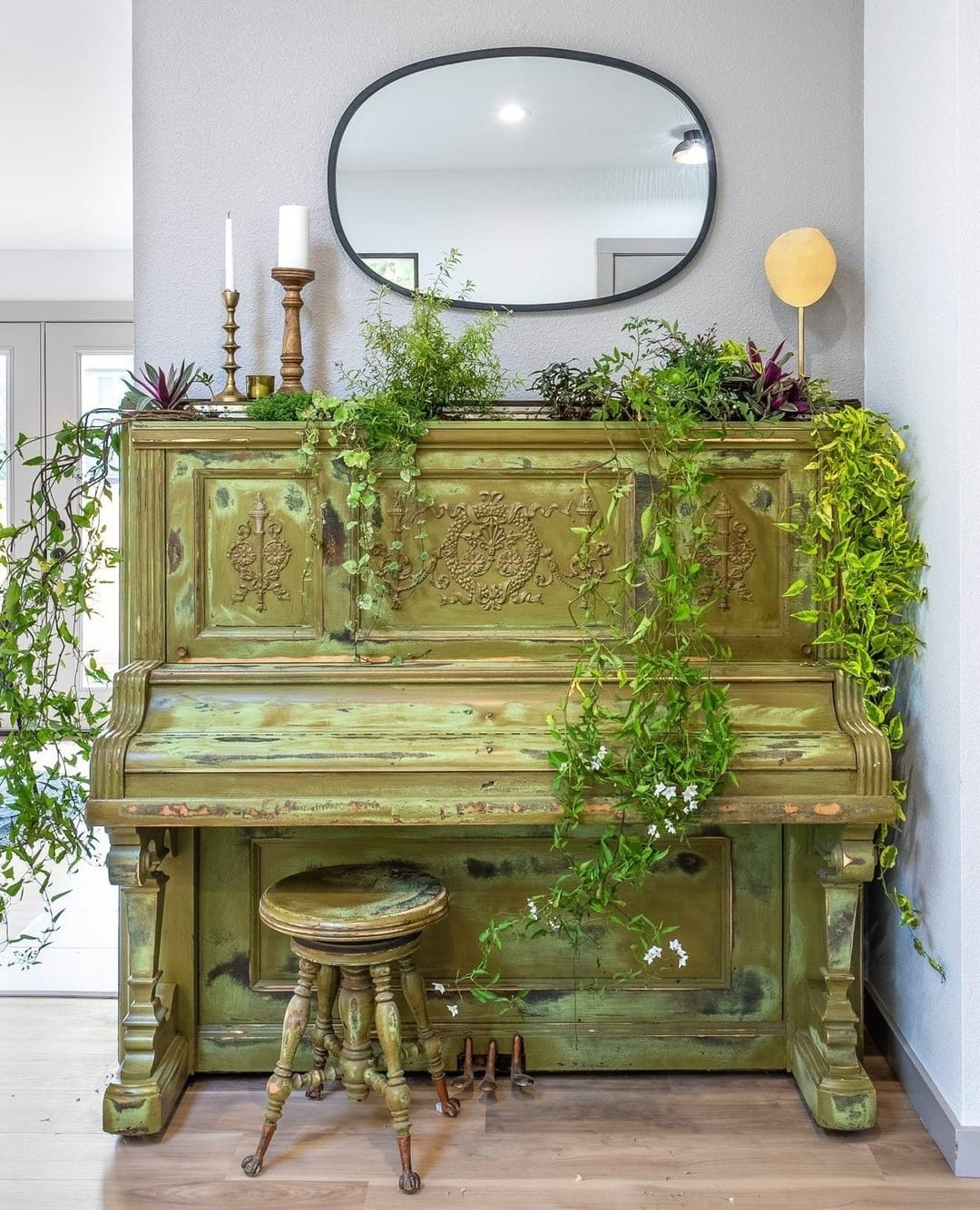 upright piano filled with plants