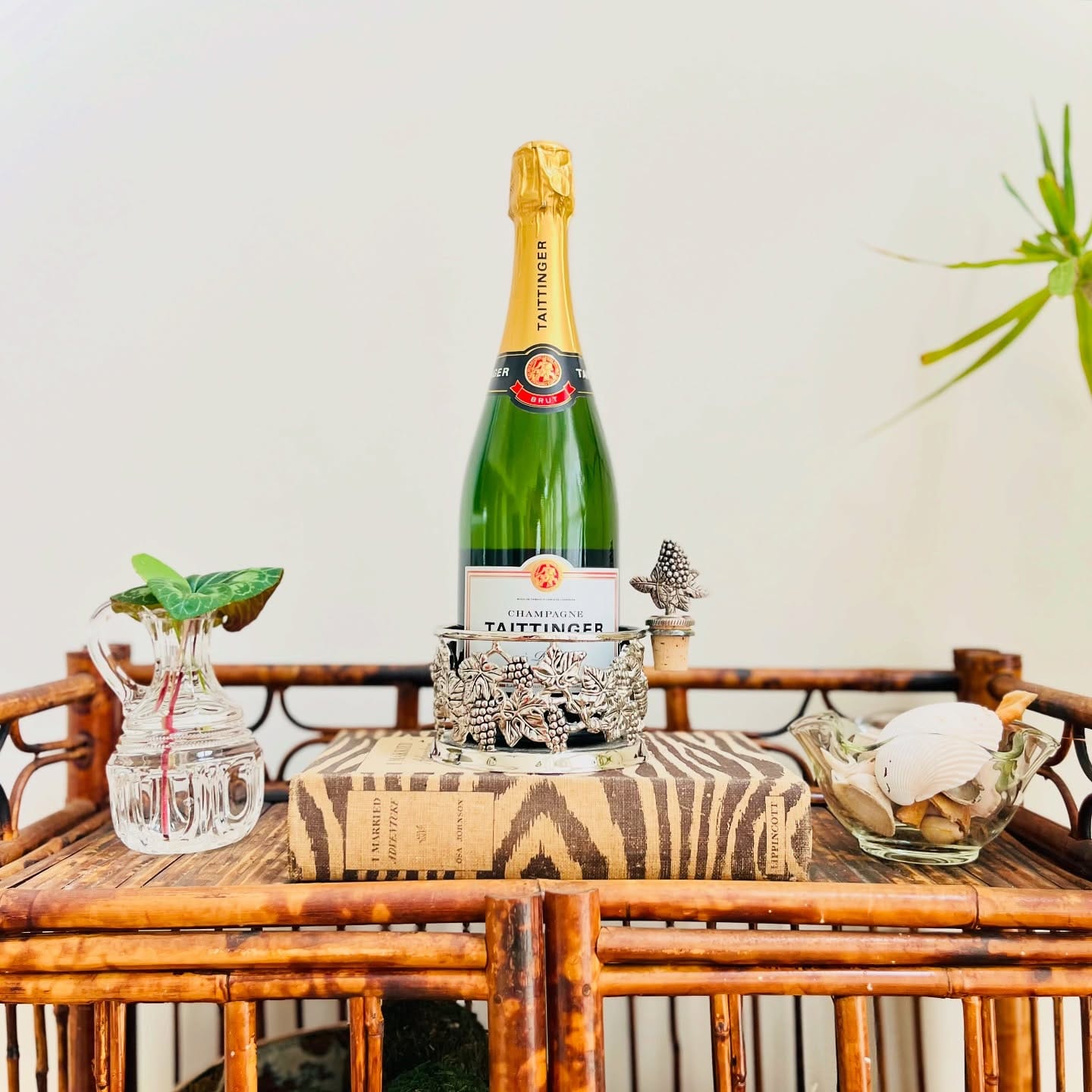 wine bottle planters with sand and seashells