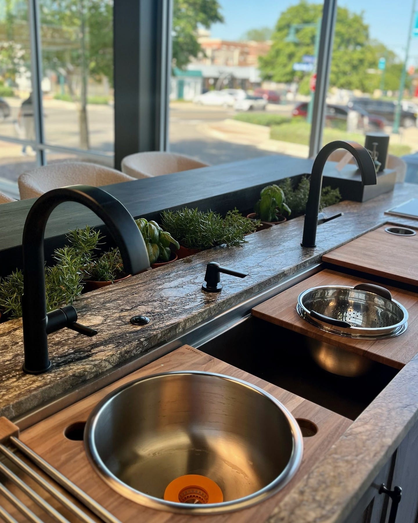 potted herbs on kitchen counter