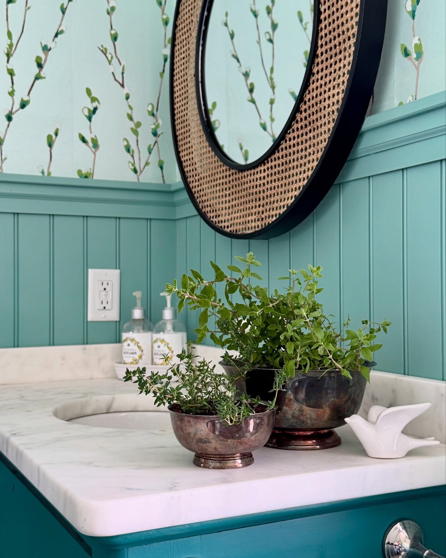 bathroom shelf with teapot planter