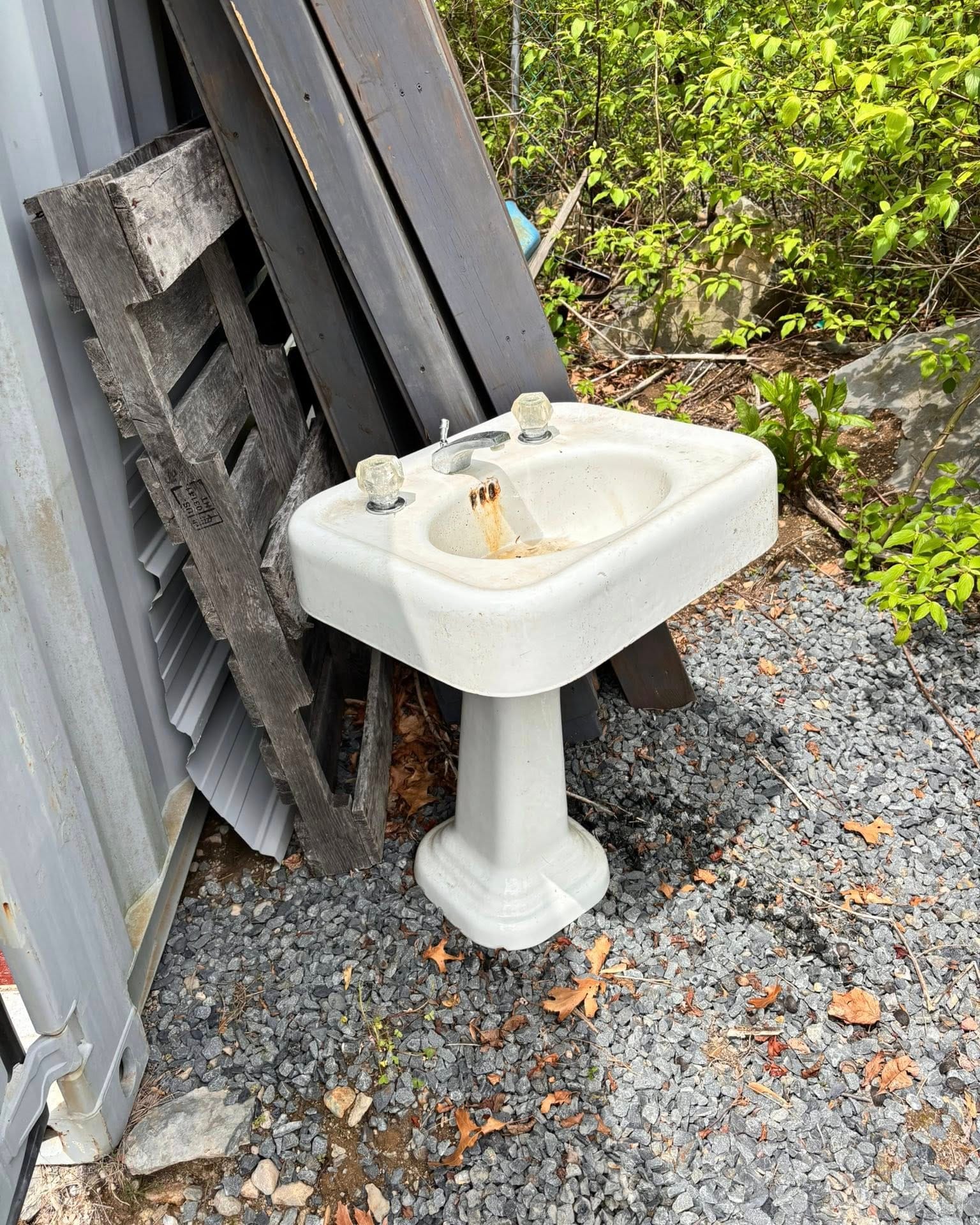 pedestal sink with miniature fairy garden
