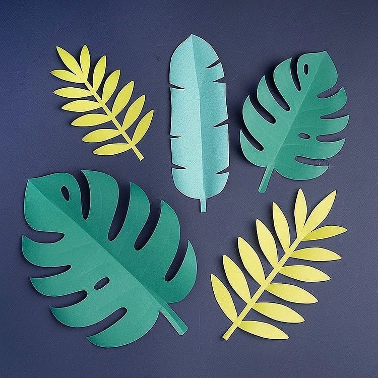 person creating leaf collage