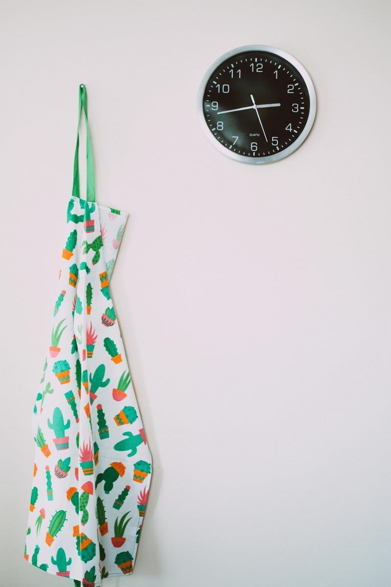 monochrome succulent wreath hanging on wall