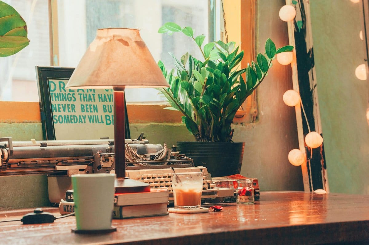 Vintage-themed wedding decor with typewriter key plant pots