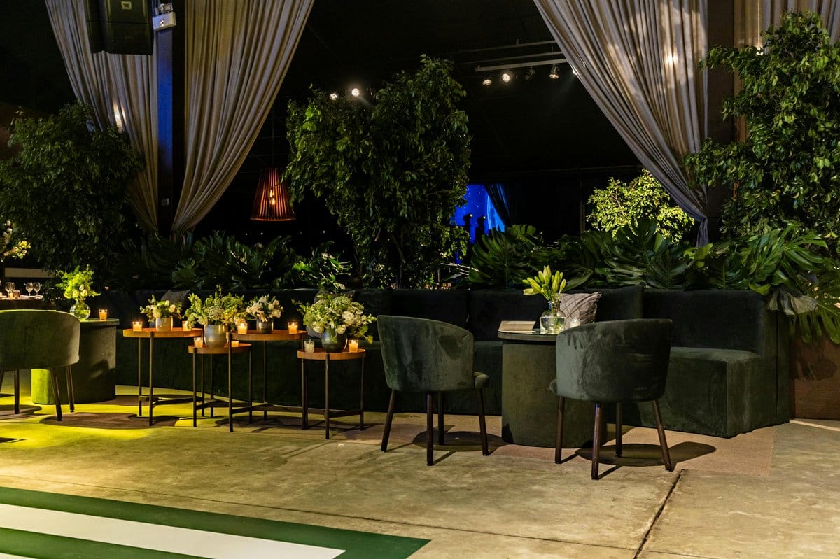 Luxurious velvet curtain with cascading greenery
