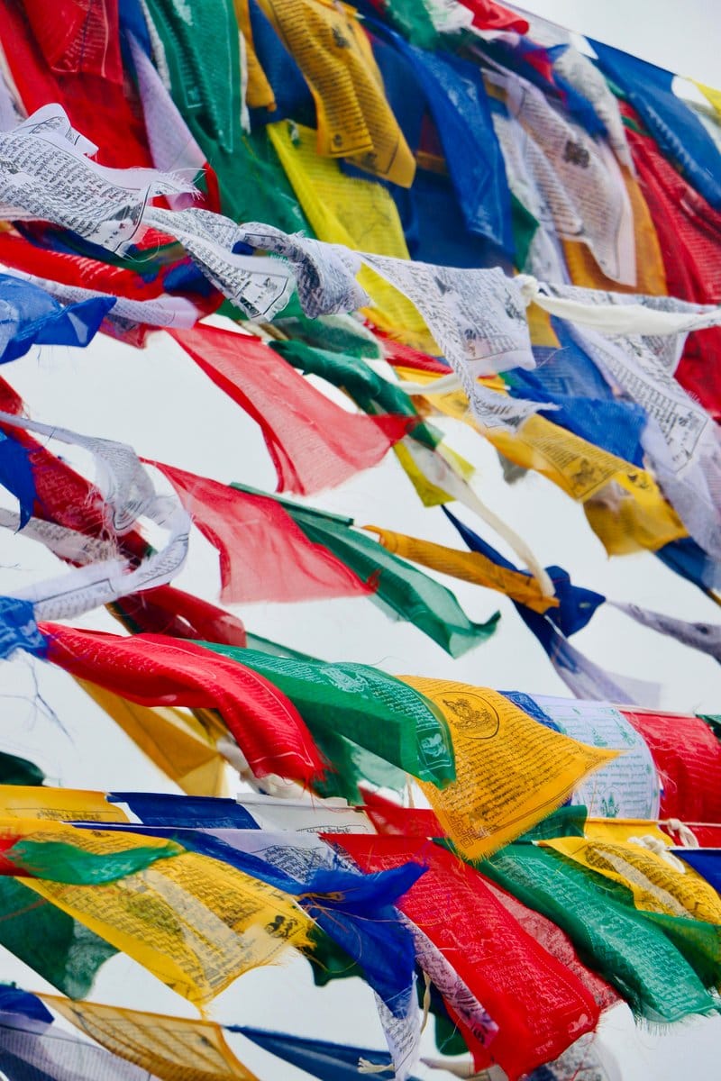 Serene meditation space with Tibetan prayer flag plant hanger
