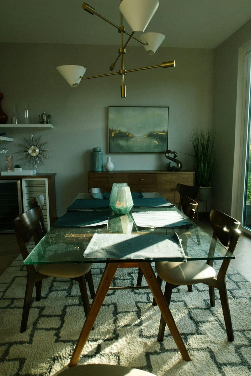 Elegant dining room with prayer flag plant hanger