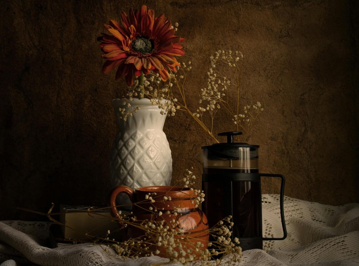 chamomile flowers in ceramic pot
