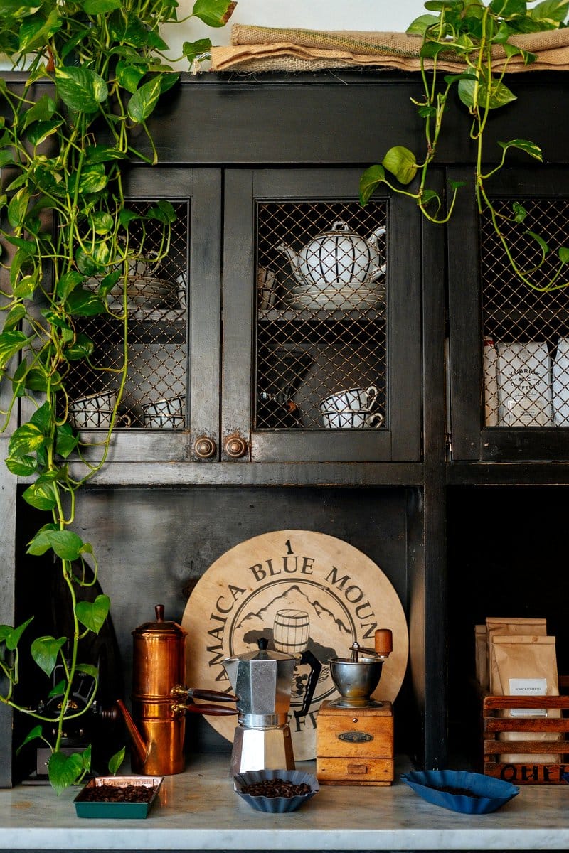 wooden crate with herbs in pots