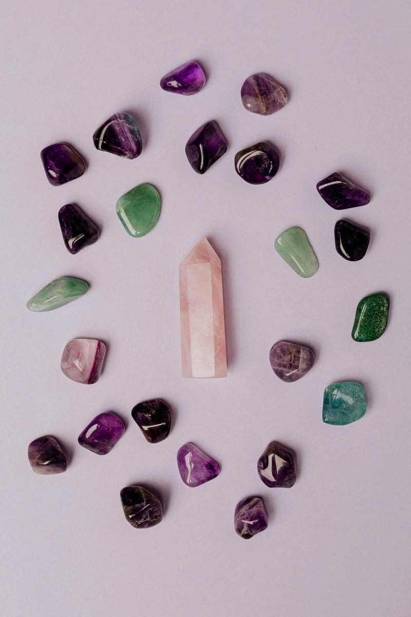 Hanging amethyst crystal mobile with green vines