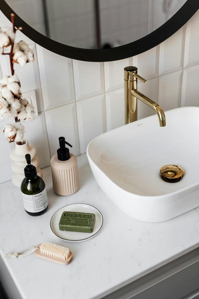 ceramic green soap dish on vanity