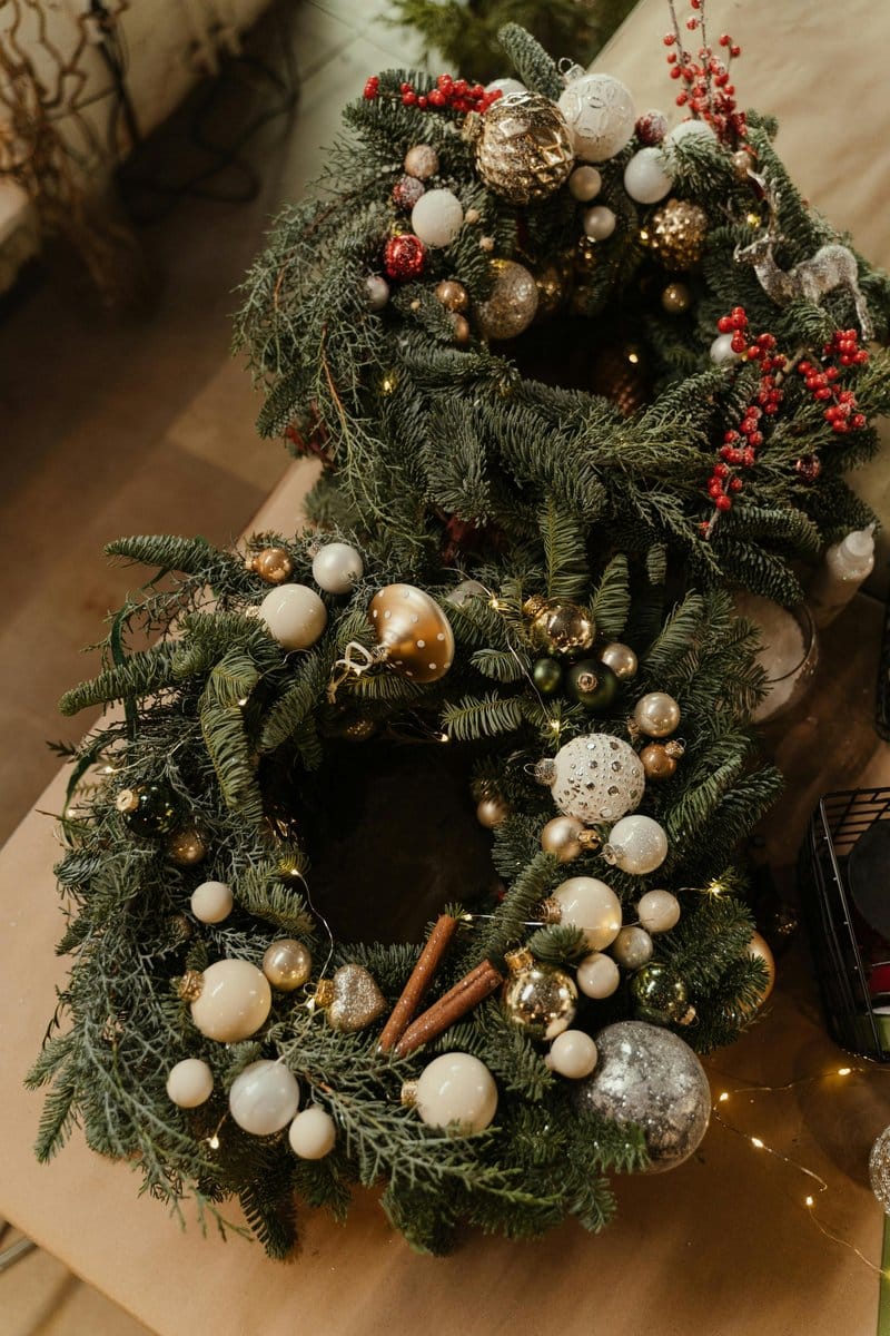 holiday-themed succulent wreath with berries