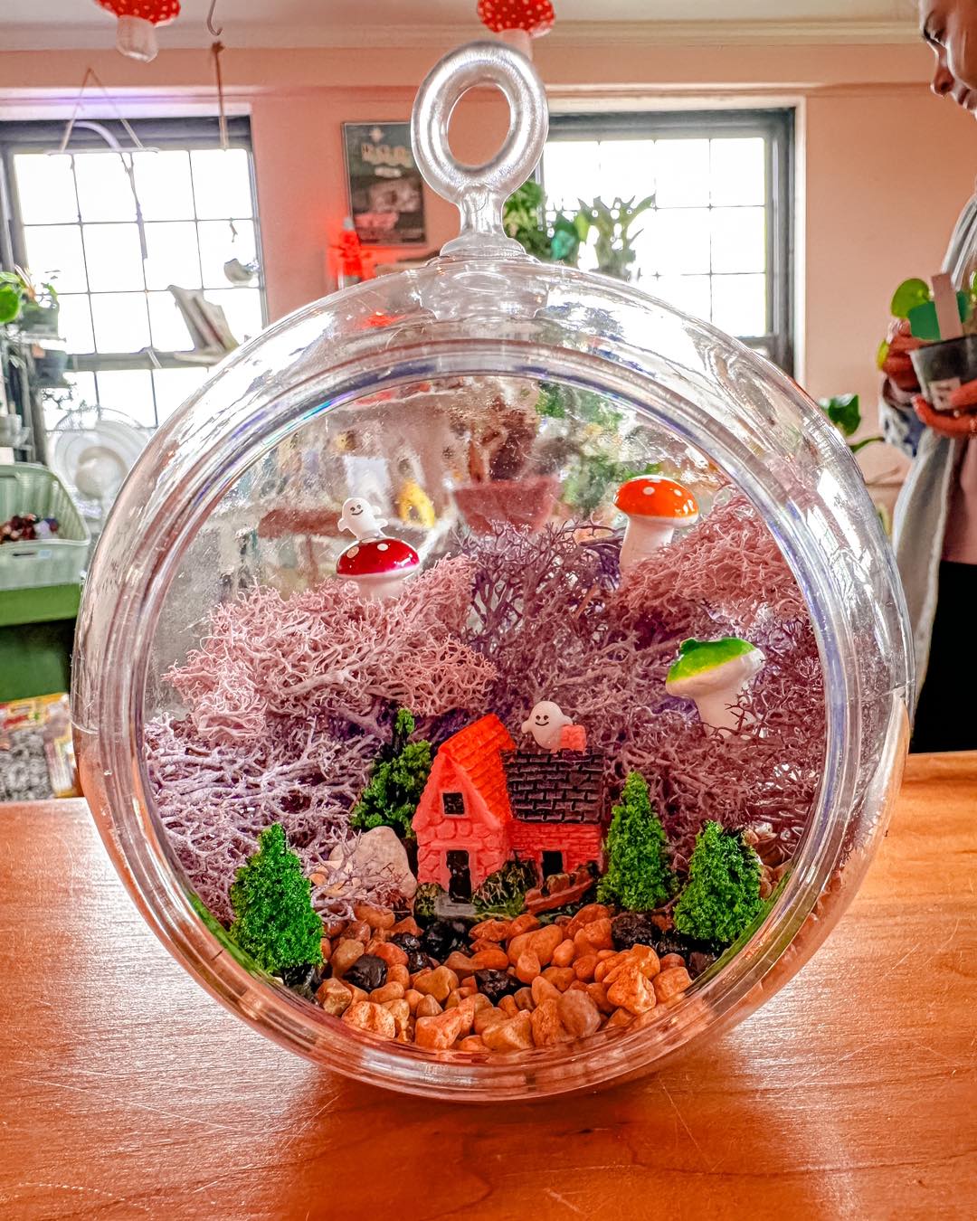 fairy garden glass terrarium with tiny figures