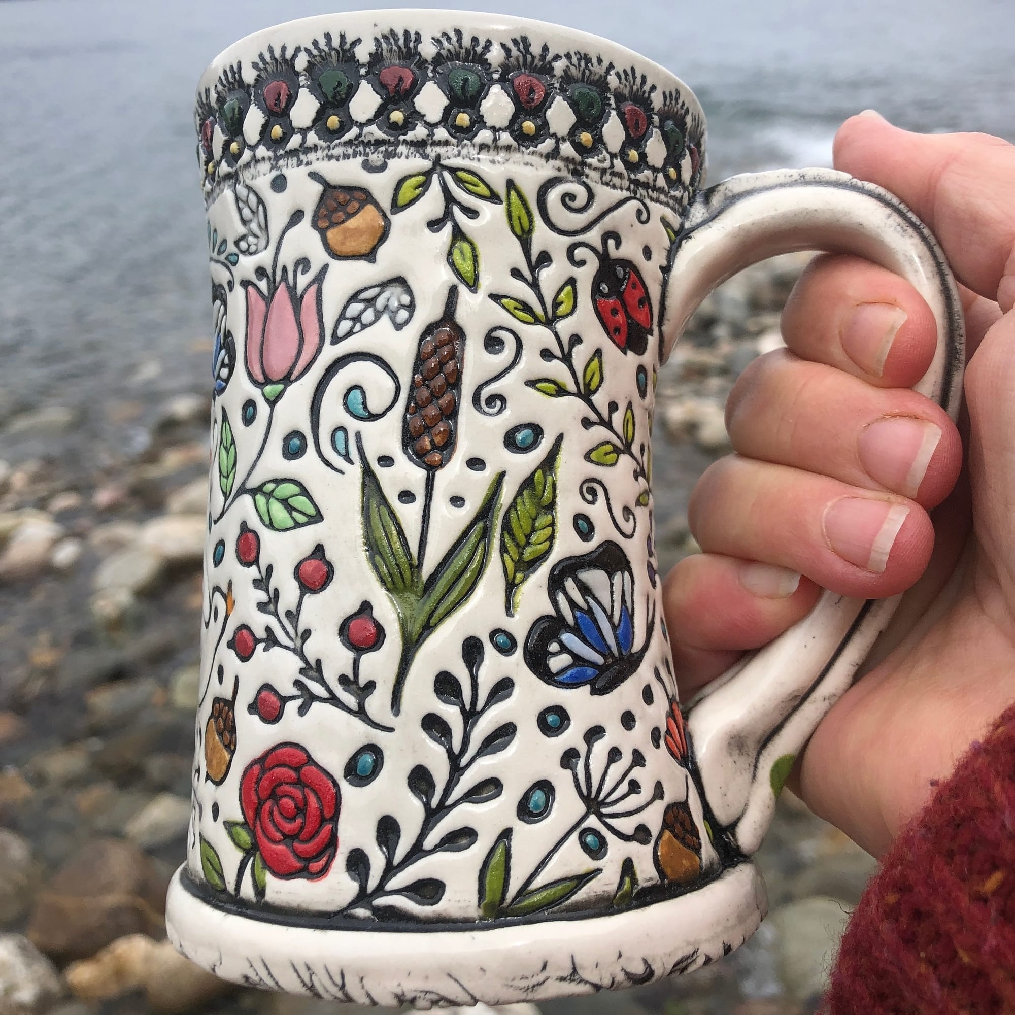 uniquely shaped mug with succulents