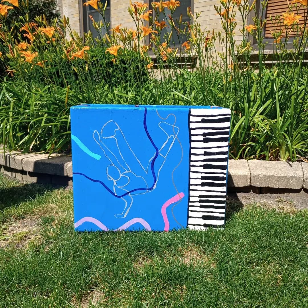 artistic painted piano planter