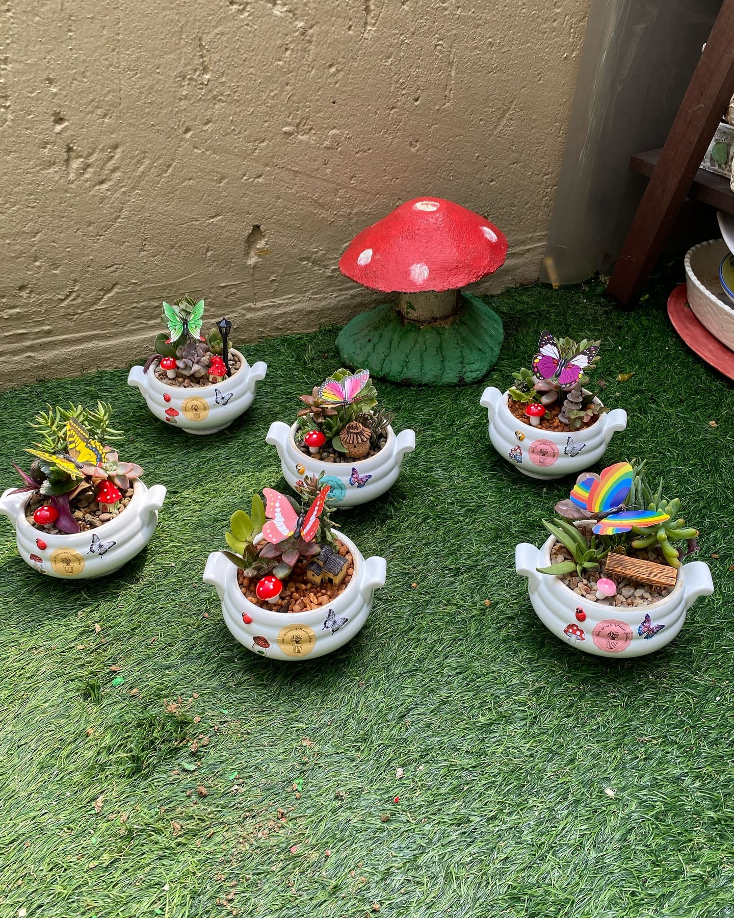 fairy garden in teapot planter