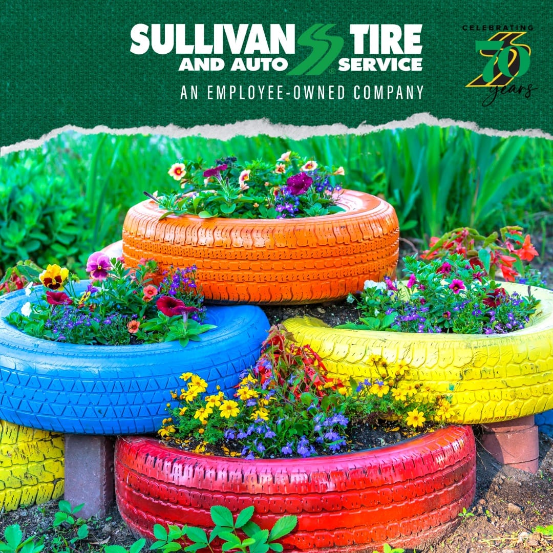colorful painted tire planters stacked