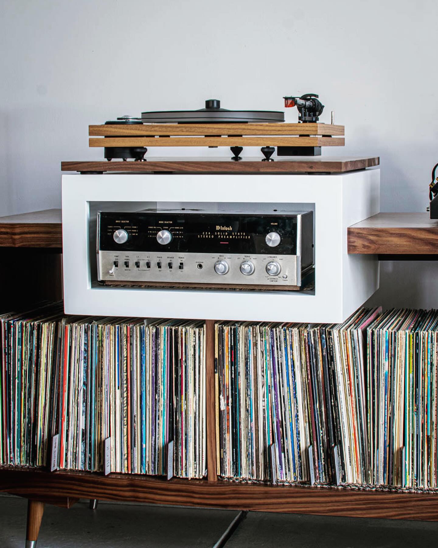 tiered tray with plants and records