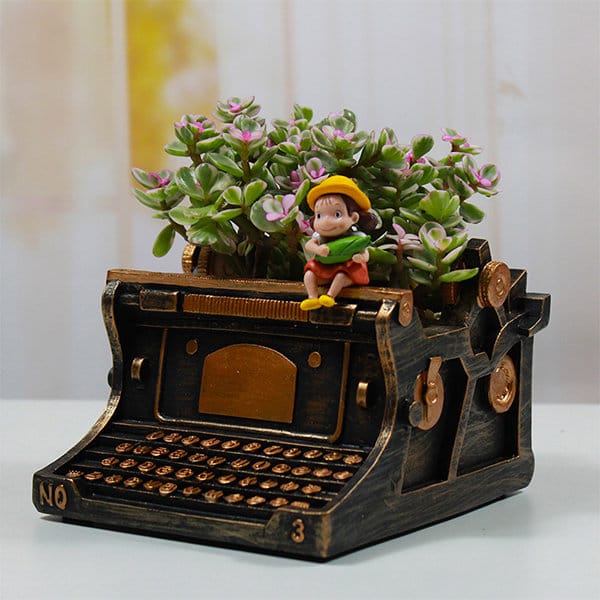 typewriter with lavender on bedside table