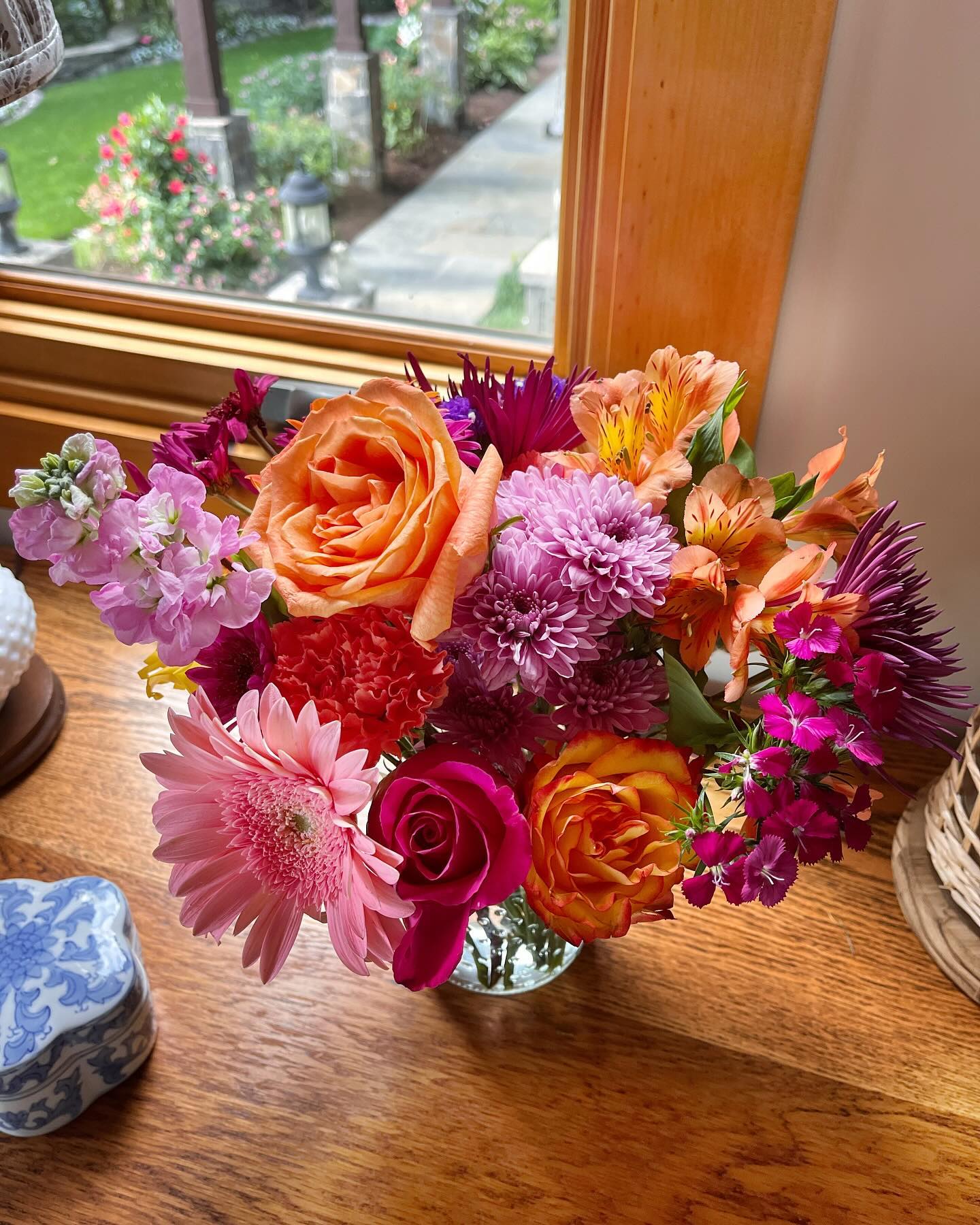 preserved plant arrangement on window ledge