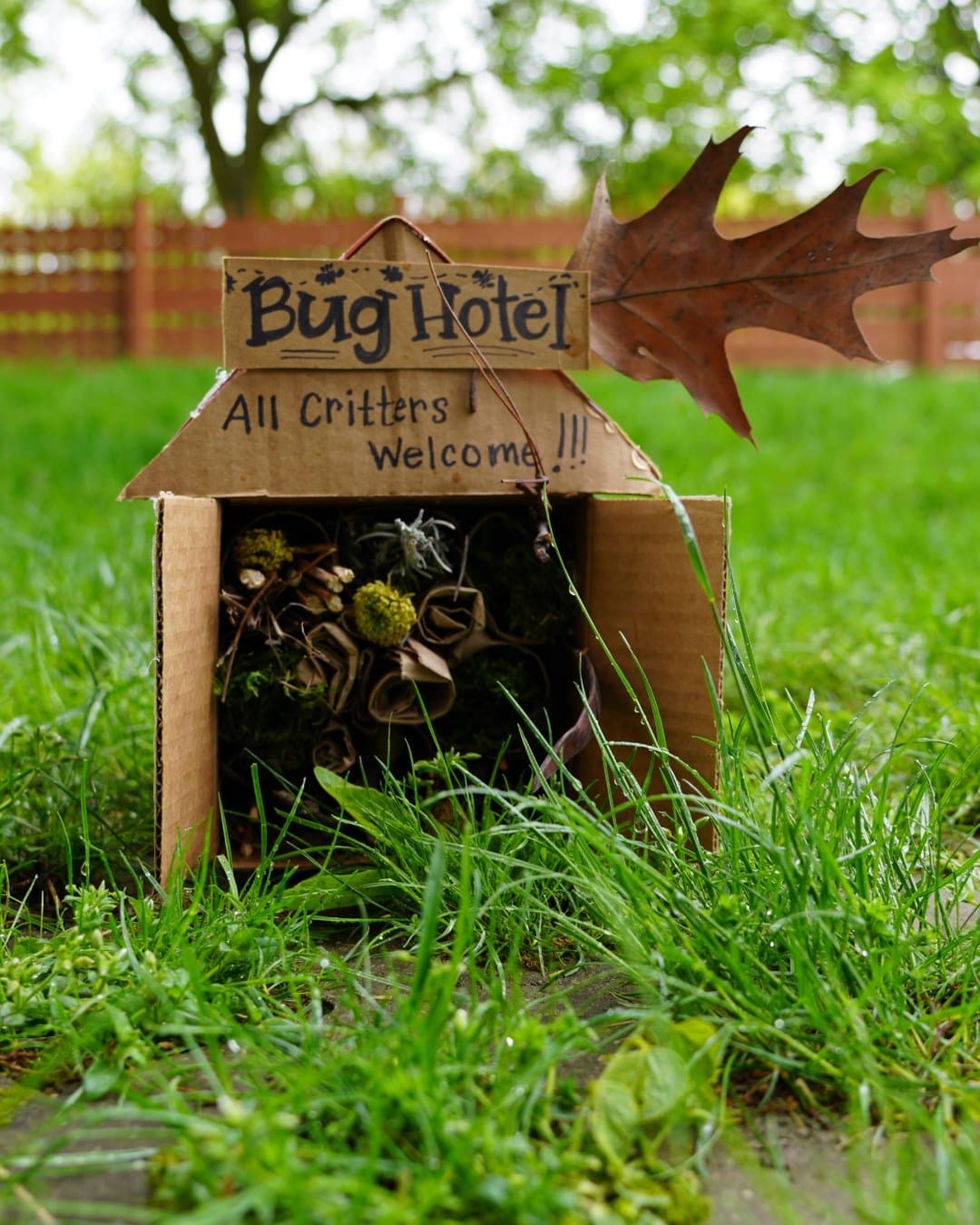 wooden bug hotel with natural materials