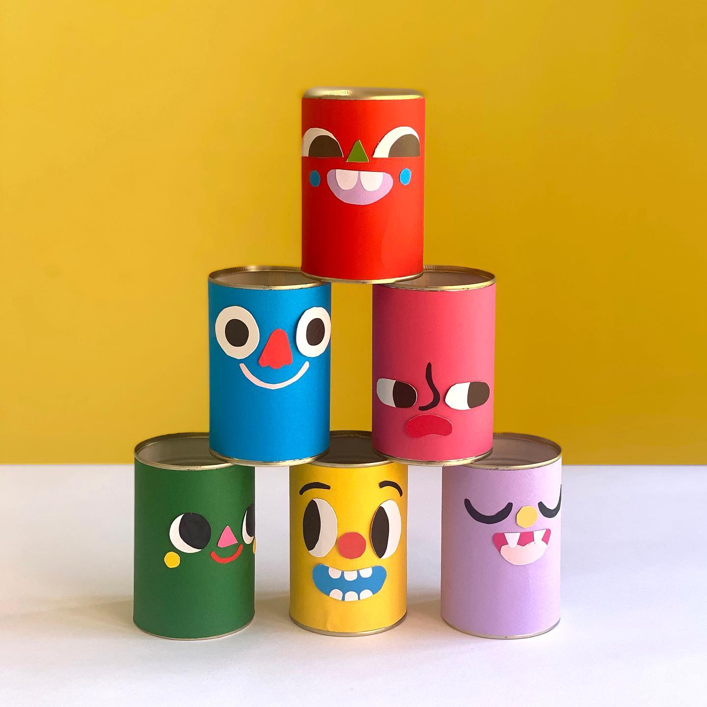 hand-painted metal tins with intricate designs