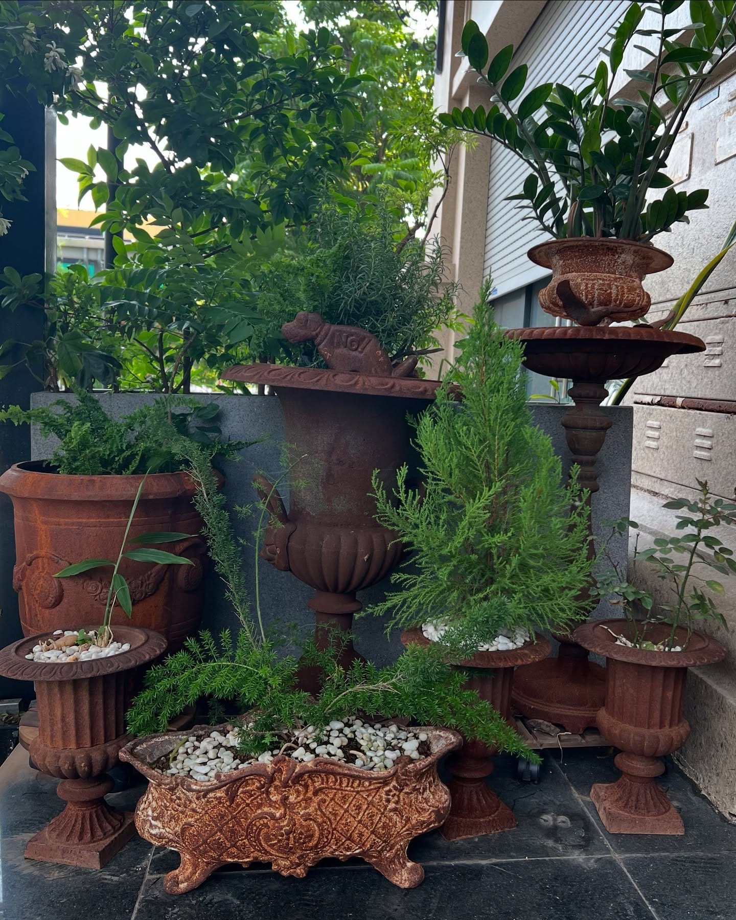weathered cast iron urn with patina