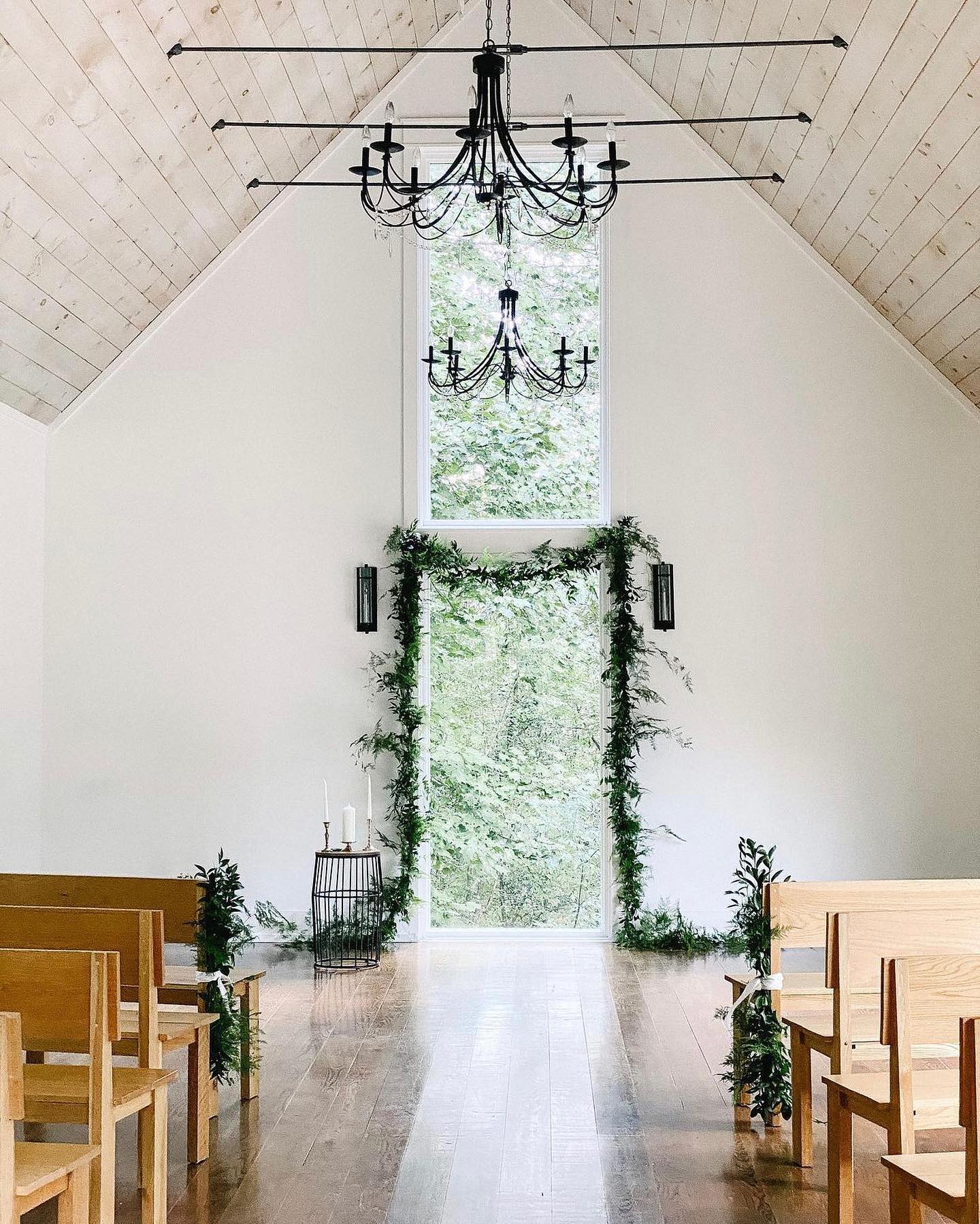 Green leafy garland draped over window