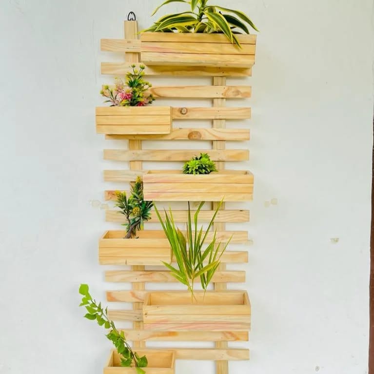 Leaning wooden ladder with plants