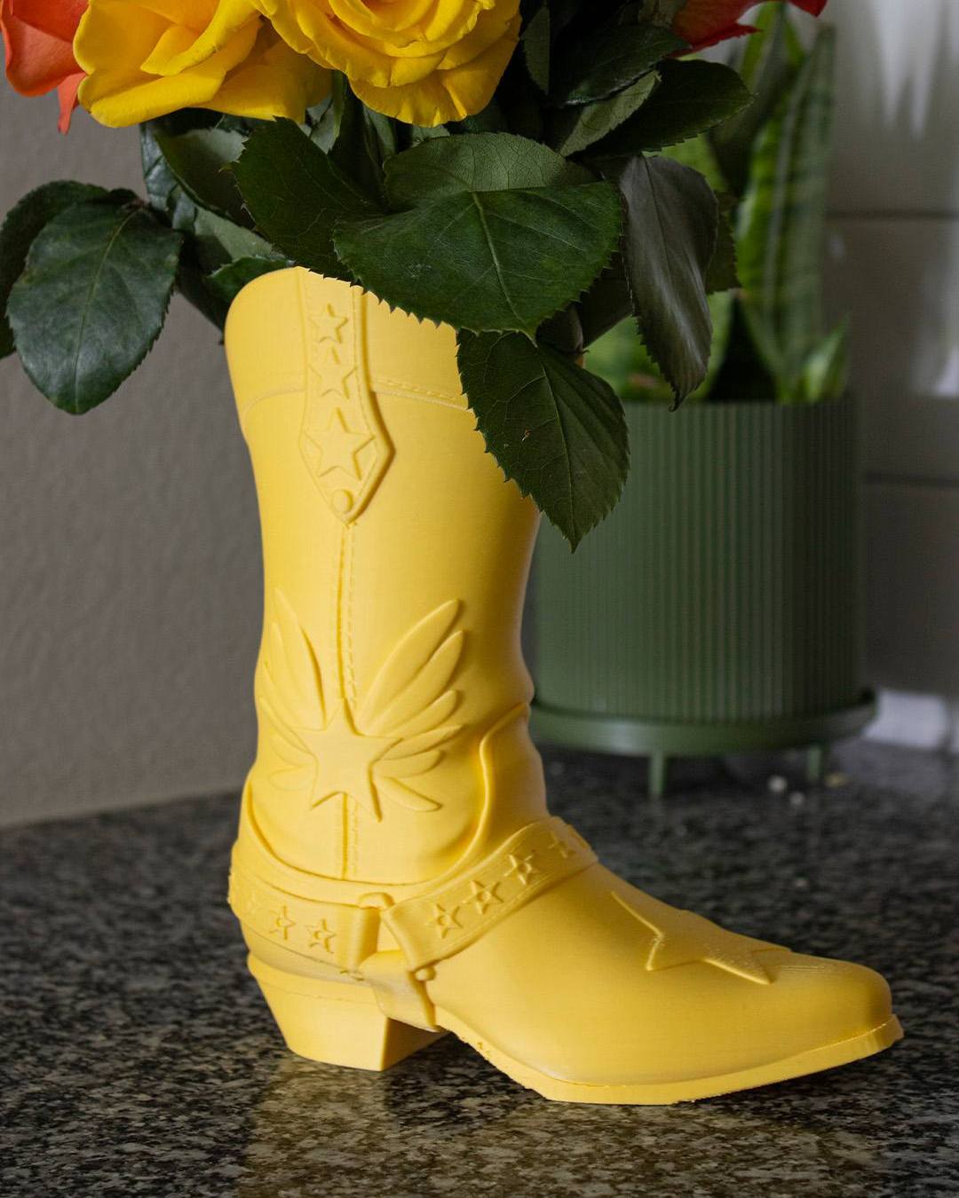 blooming flowers in worn boots