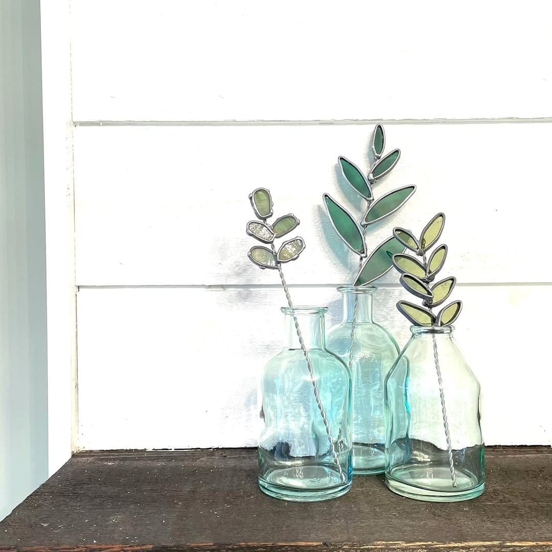 eucalyptus sprigs in a glass vase