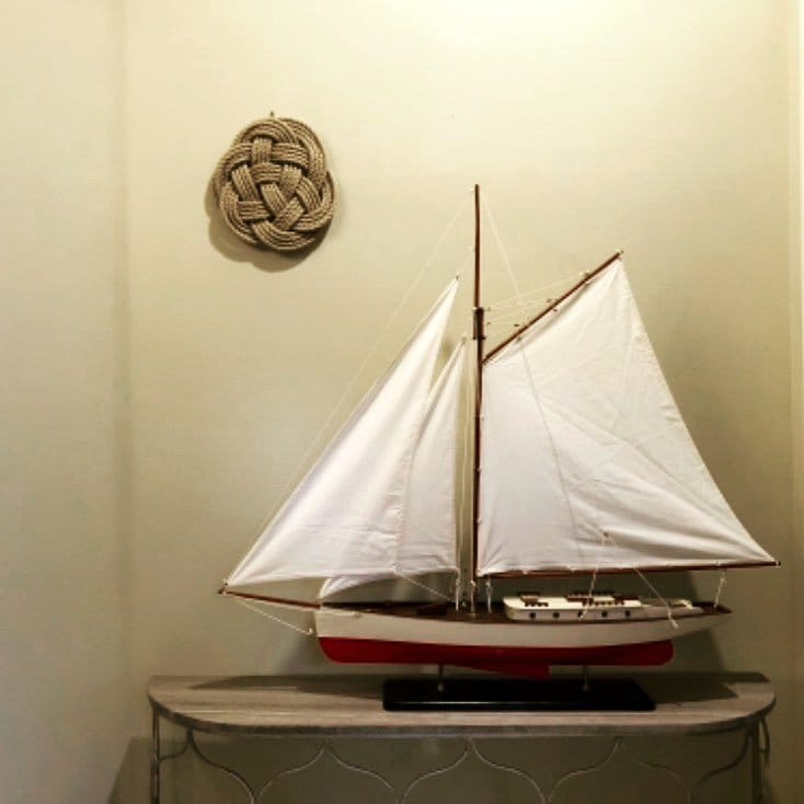 Nautical rope mirror on wall