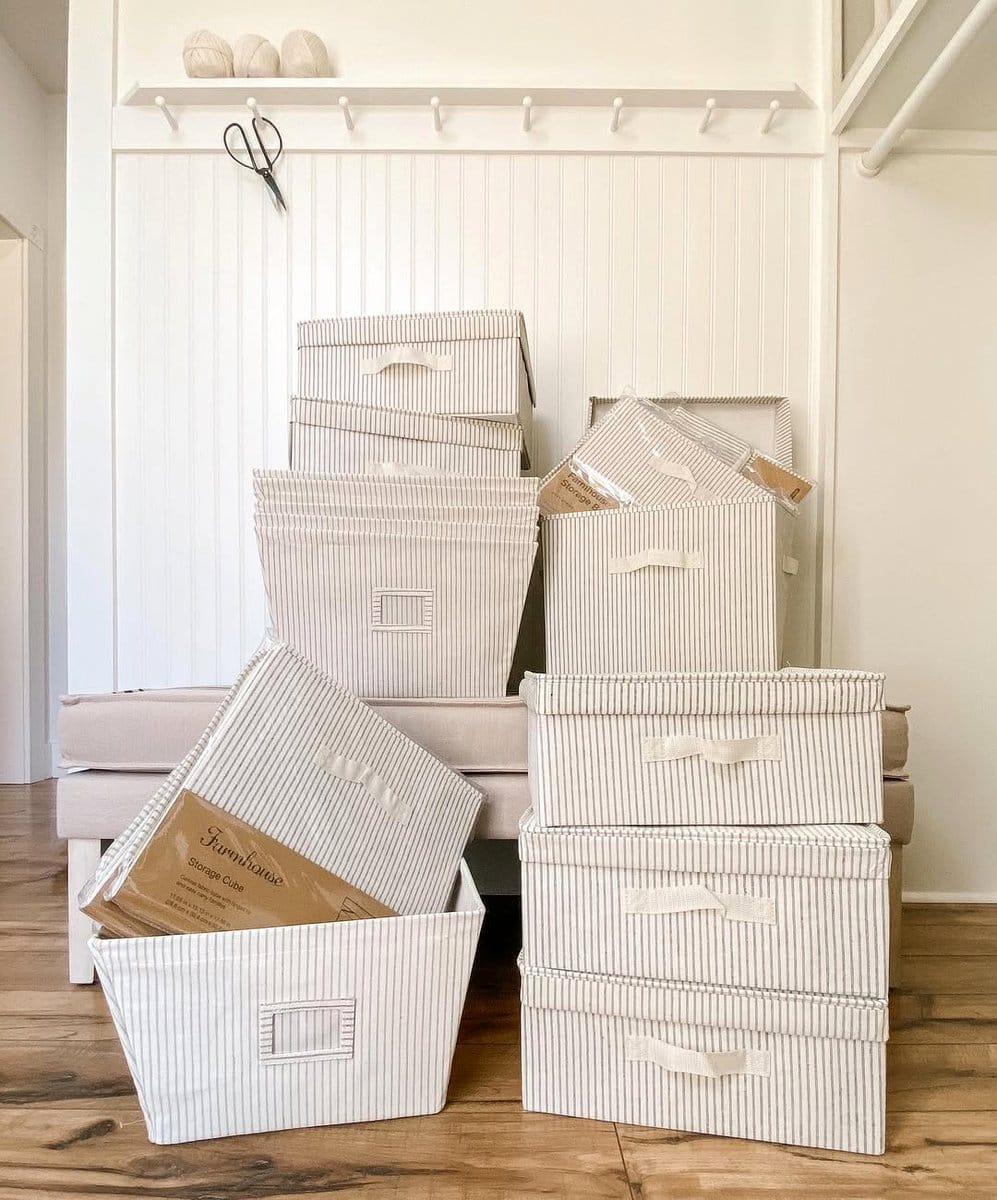 mud cloth fabric boxes on closet shelf