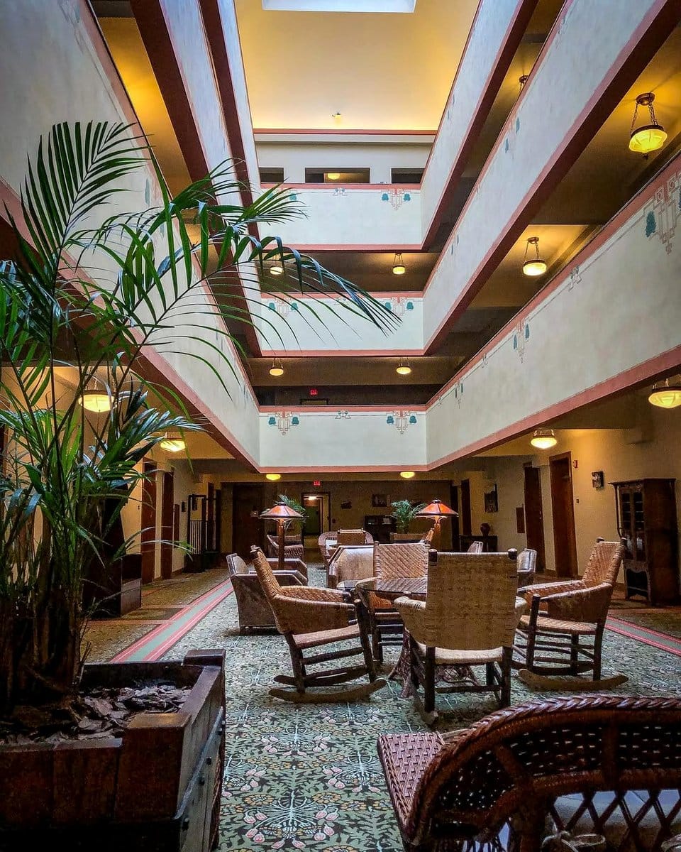 black and white planter in monochrome room