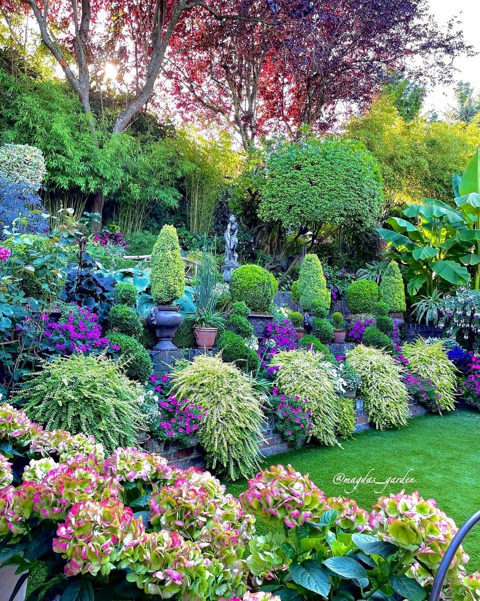 container garden in cast iron urns