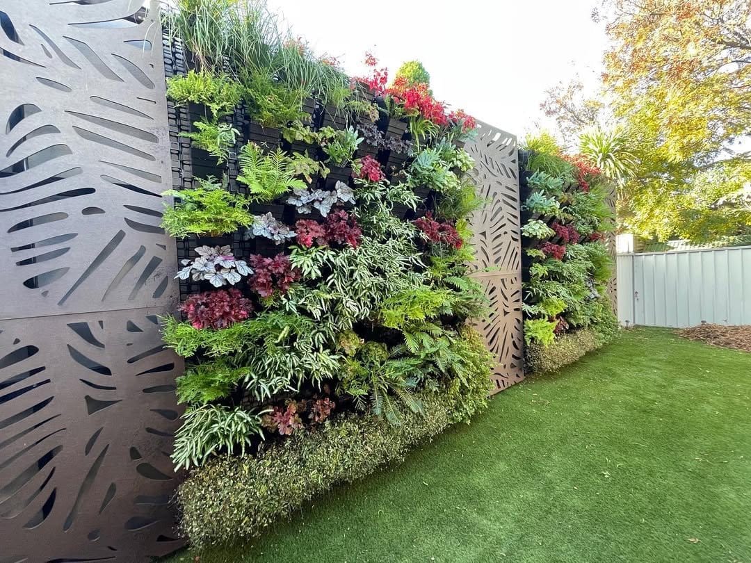 Lush mixed herbs in vertical wooden frames