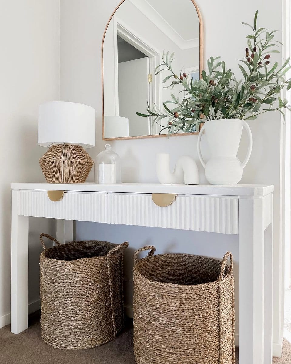 rattan baskets under console table