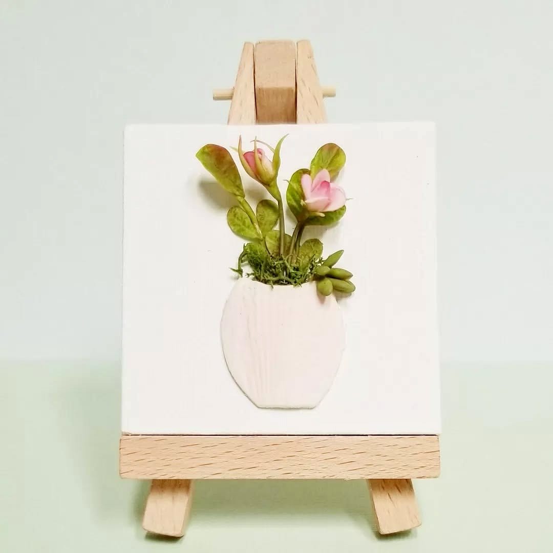 small succulents in hat box