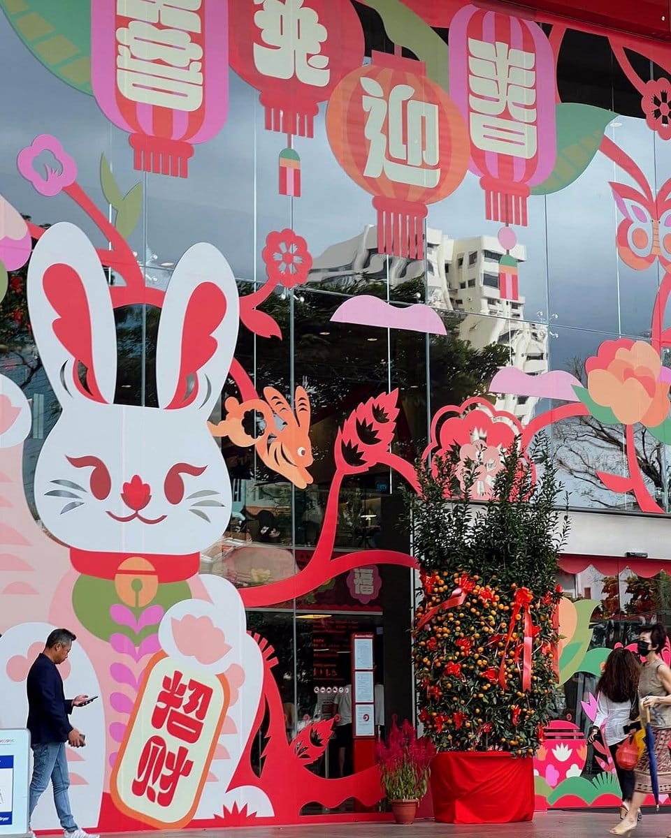 window adorned with colorful leaf decals