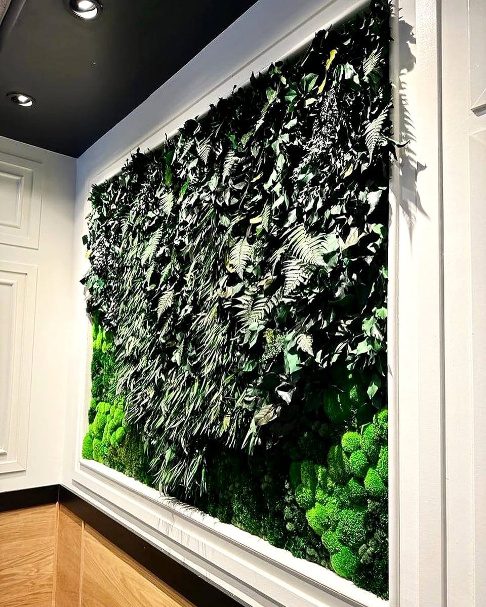restaurant with moss wall decor