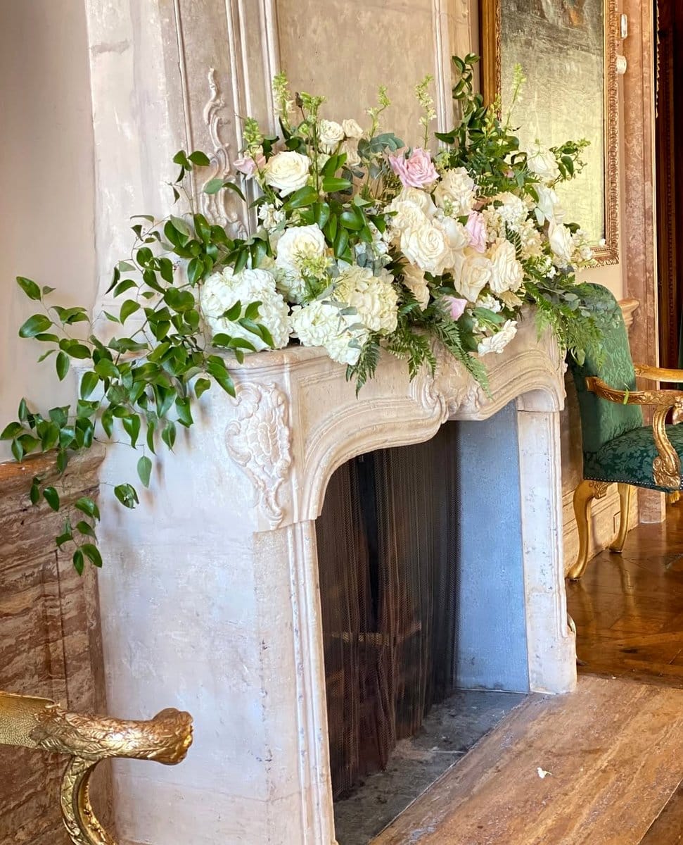 orchid arrangement on mantel