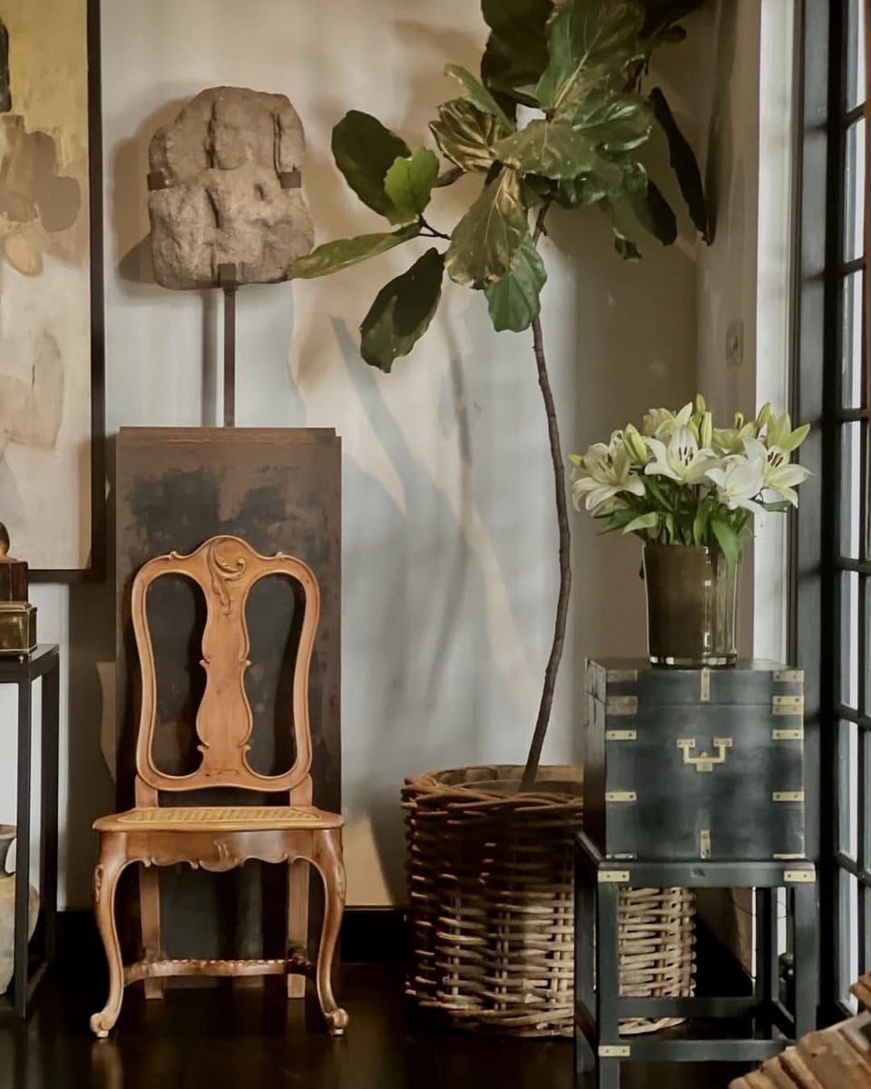 monochrome room with brass planter