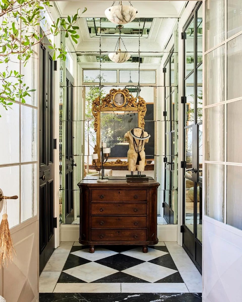 Collection of antique mirrors on rustic wall